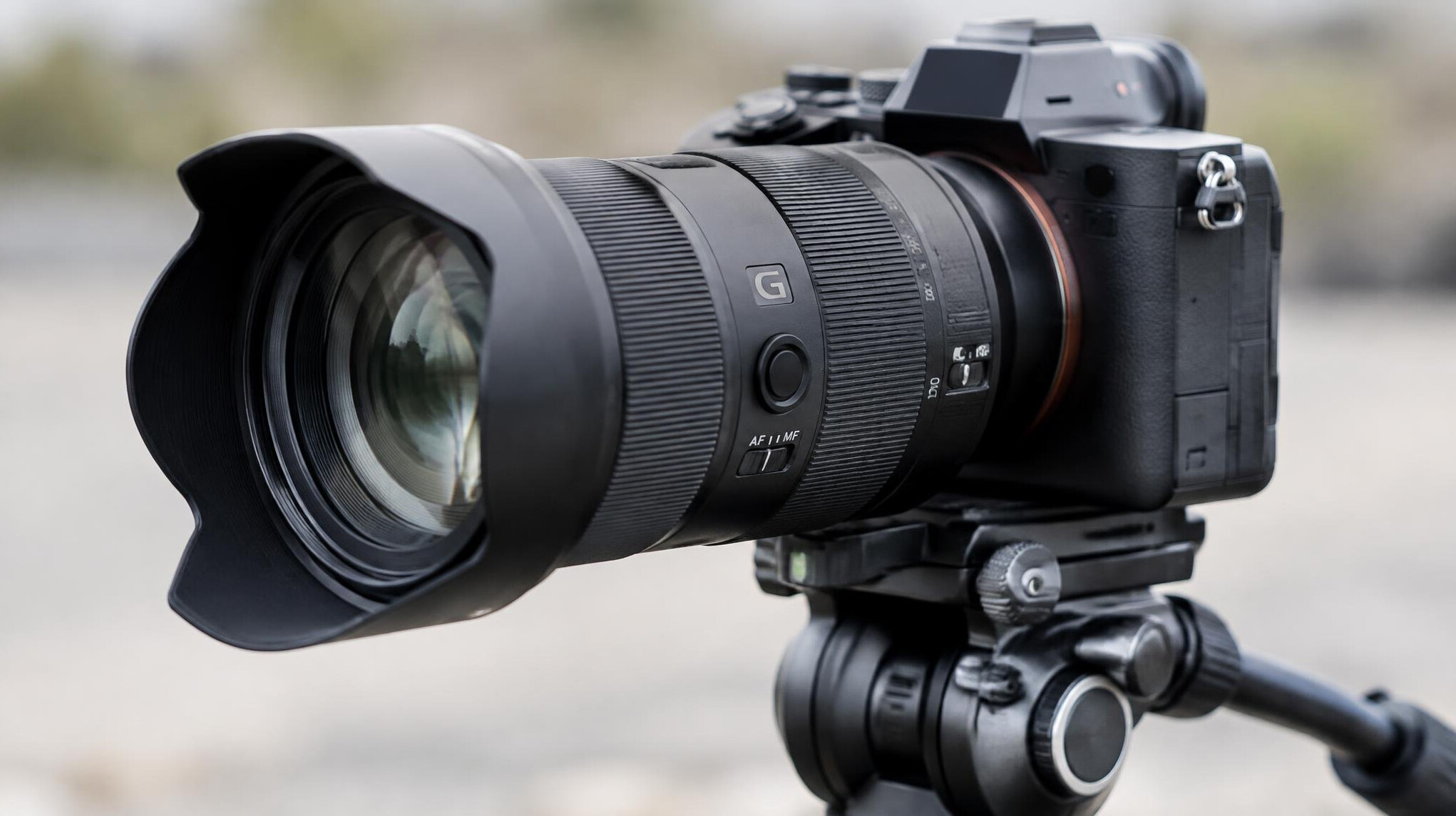 Camera lens close up on a tripod